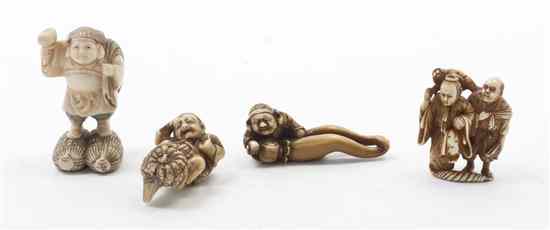 Appraisal: Four Figural Netsuke one of a pair of figures the