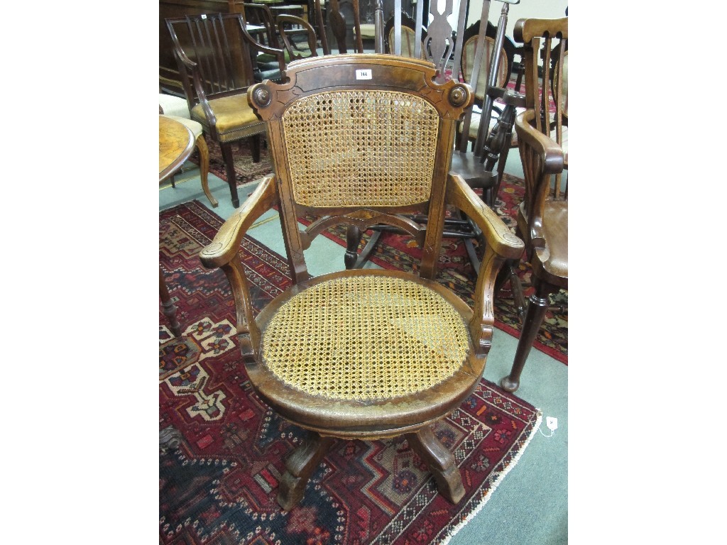 Appraisal: Victorian walnut Bergere swivel desk chair