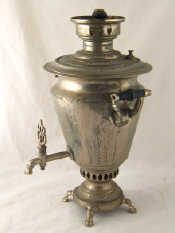 Appraisal: A plated samovar on four feet ht cm with cloth