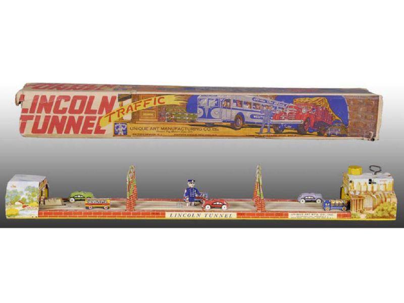 Appraisal: Unique Art Tin Wind-Up Lincoln Tunnel Toy with Ori Description