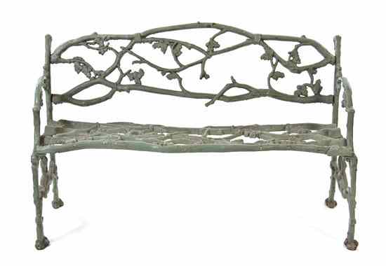 Appraisal: An American Cast Iron Garden Bench having naturalistic oak branch