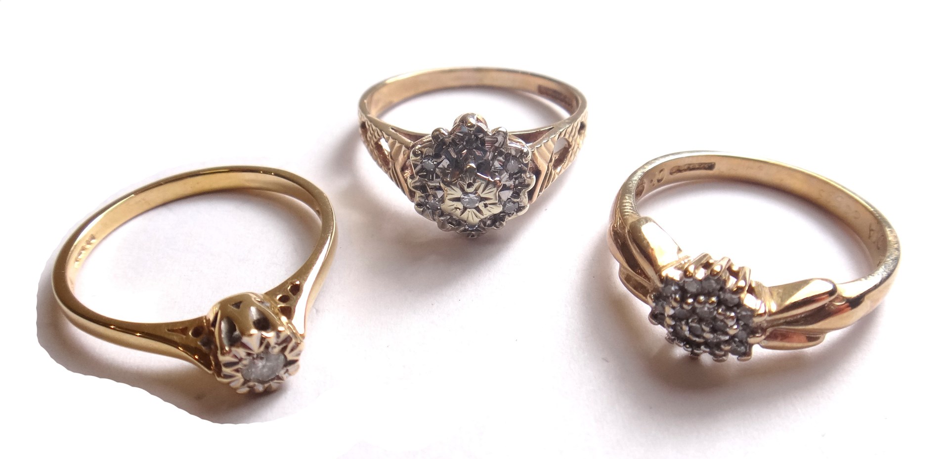 Appraisal: A ct gold and diamond set cluster ring pierced with