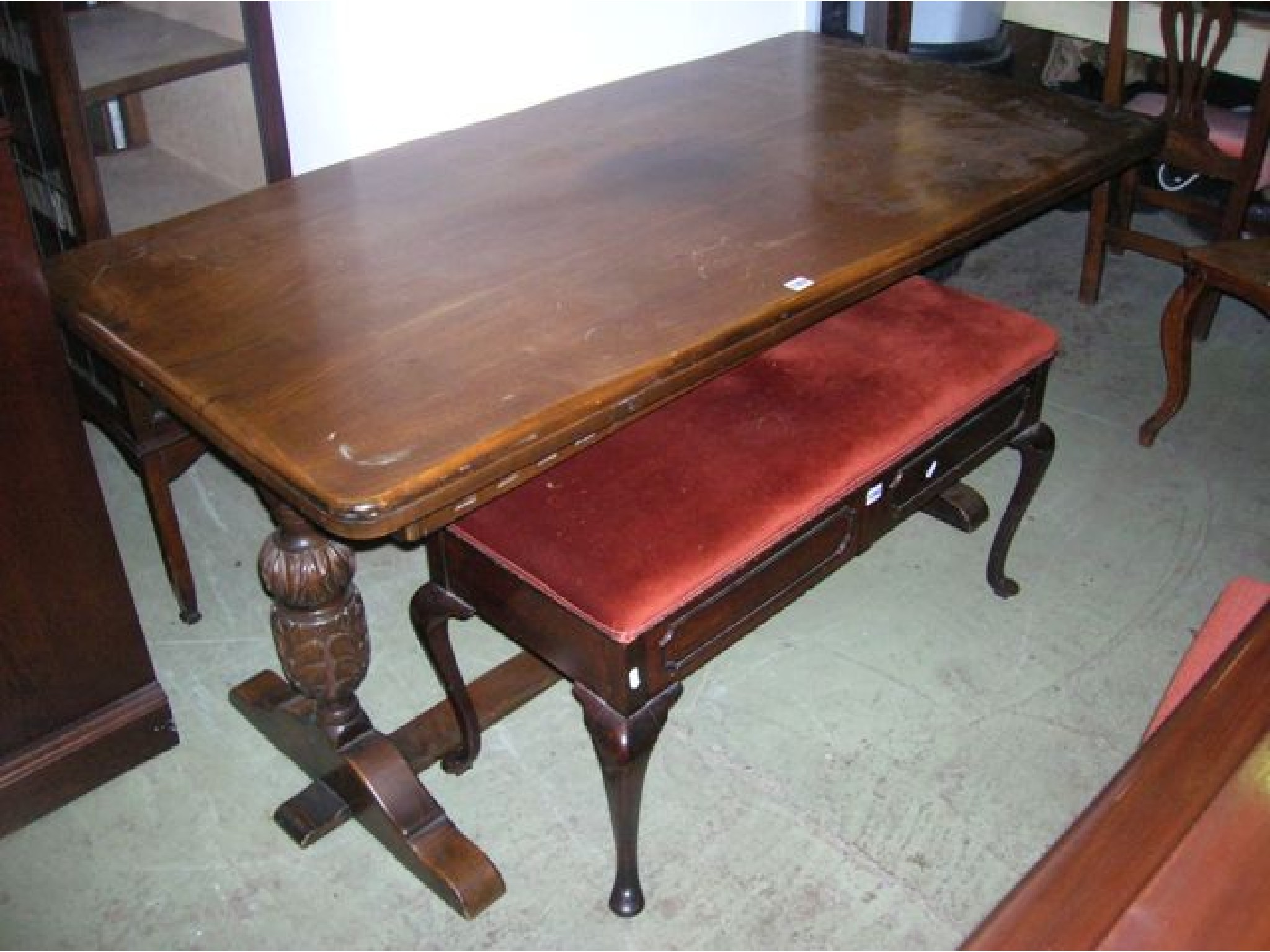 Appraisal: A reproduction oak refectory table the rectangular top raised on