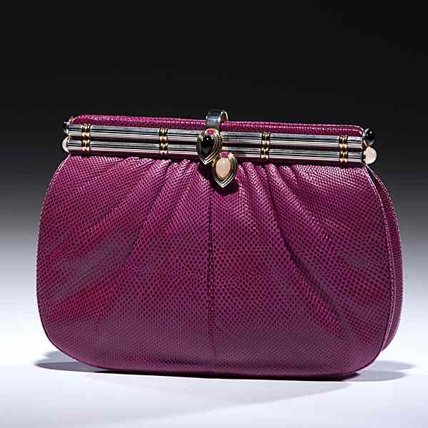 Appraisal: Judith Lieber Snakeskin Evening Clutch A vintage Judith Lieber fuchsia