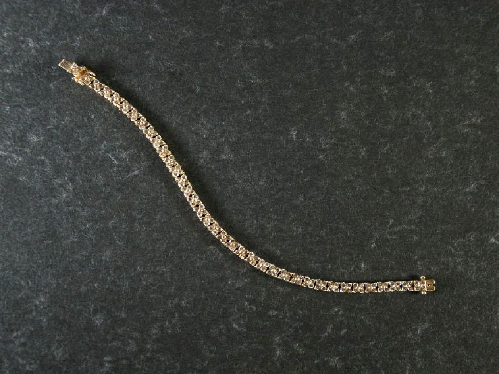 Appraisal: ct GOLD AND DIAMOND FLEXIBLE BRACELET with thirty seven square