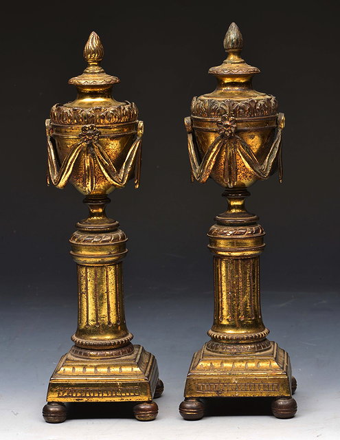 Appraisal: A PAIR OF FRENCH ORMOLU NEO-CLASSICAL CASSOLETTES with swag ornament