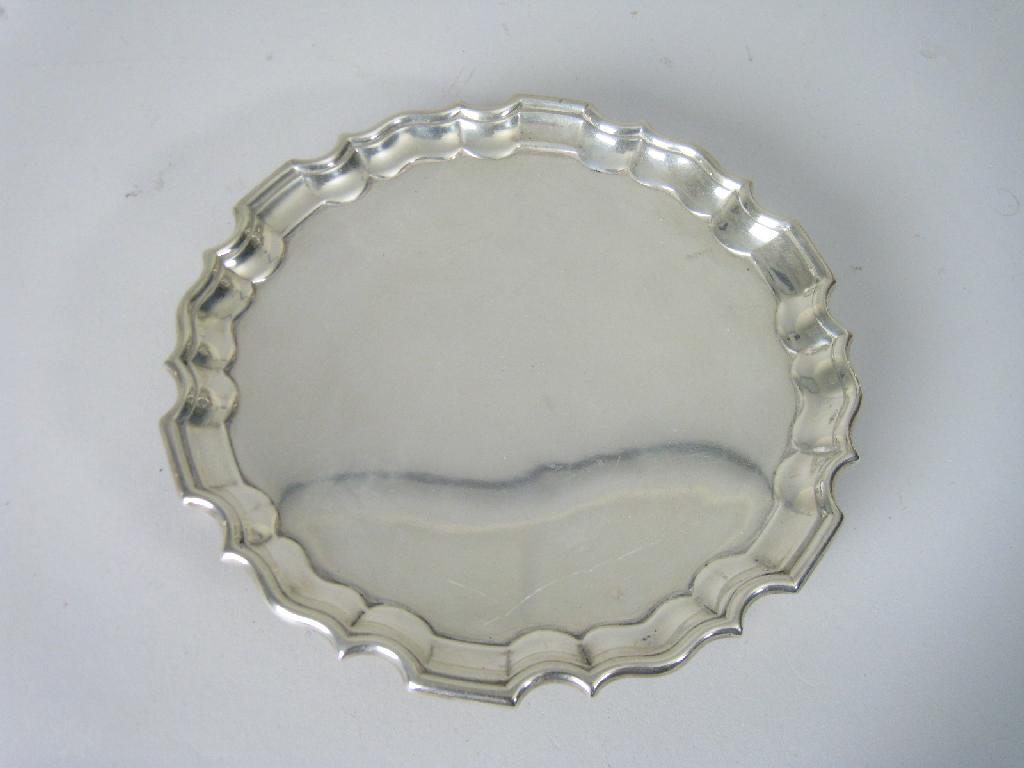 Appraisal: A Victorian Card Tray with pie crust rim and shaped