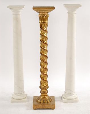 Appraisal: Two similar turned Carrara marble columns each with a square