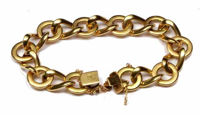 Appraisal: AN CT GOLD HOLLOW CURB AND CIRCULAR LINKED BRACELET