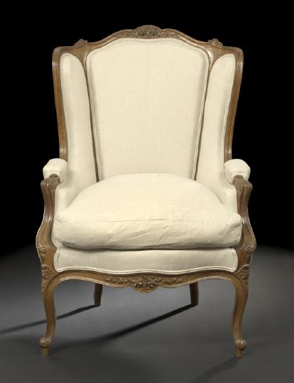 Appraisal: Louis XV-Style Fruitwood Bergere avec Orielles the trisected padded back