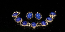 Appraisal: Lapis Lazuli Gold Bracelet and Matching Earrings Seven well polished