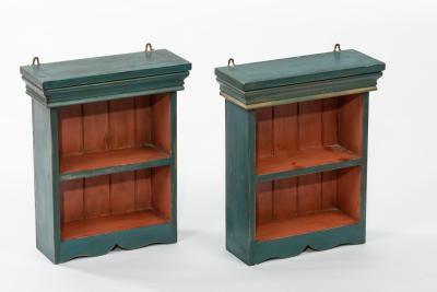 Appraisal: A pair of green painted hanging shelves cm wide