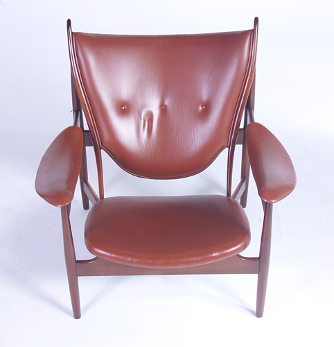 Appraisal: FINN JUHL Chieftain chair upholstered in reddish-brown leather Unmarked x