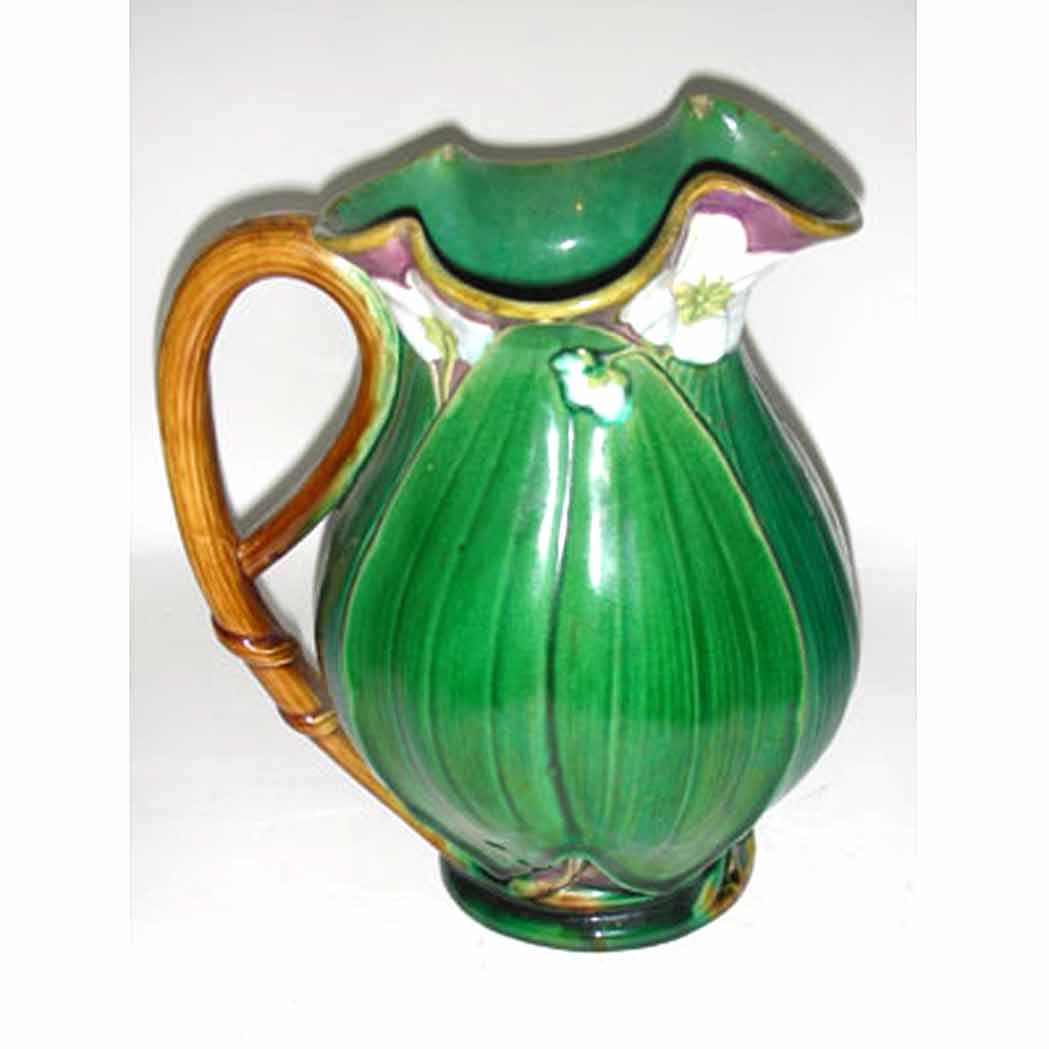 Appraisal: Two English Majolica Water Pitchers Each formed as a lily