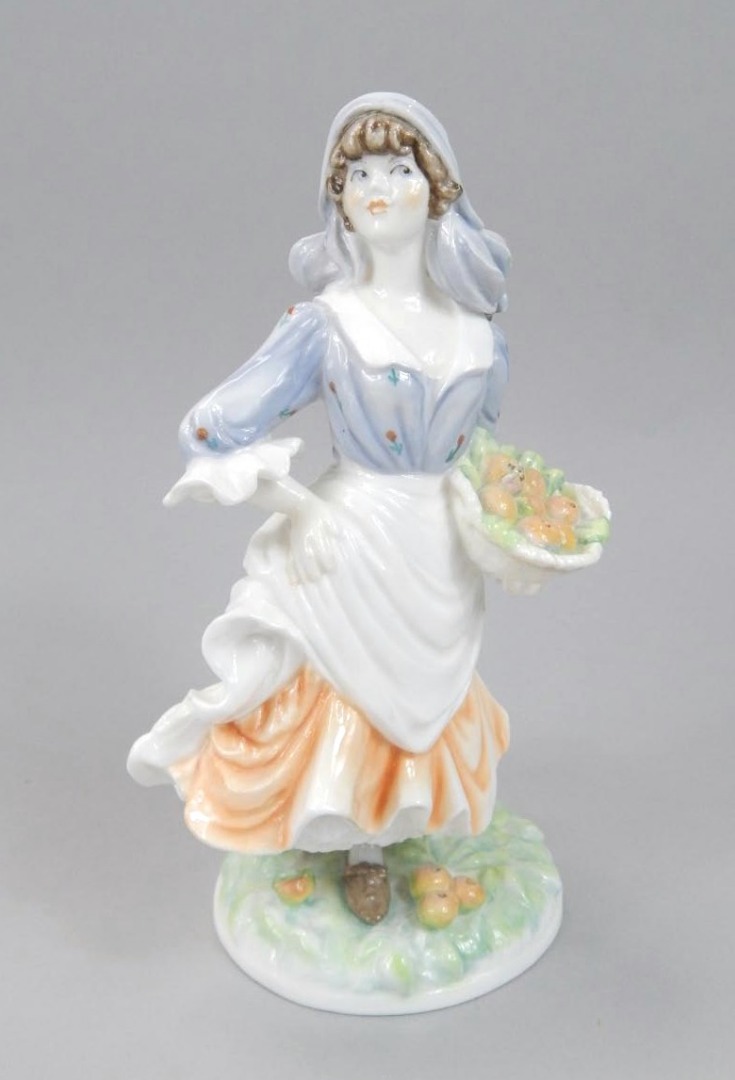 Appraisal: A Royal Worcester limited edition figure Rosie picking Apples number