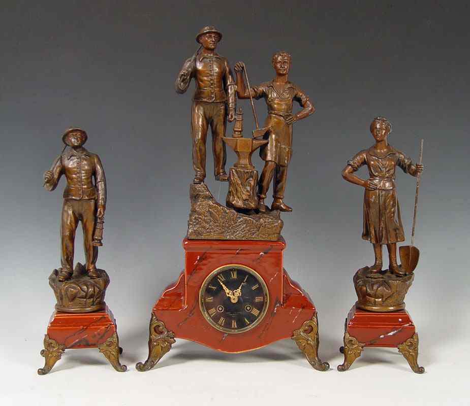 Appraisal: FIGURAL CLOCK GARNITURE SET Cast metal faux marble base with