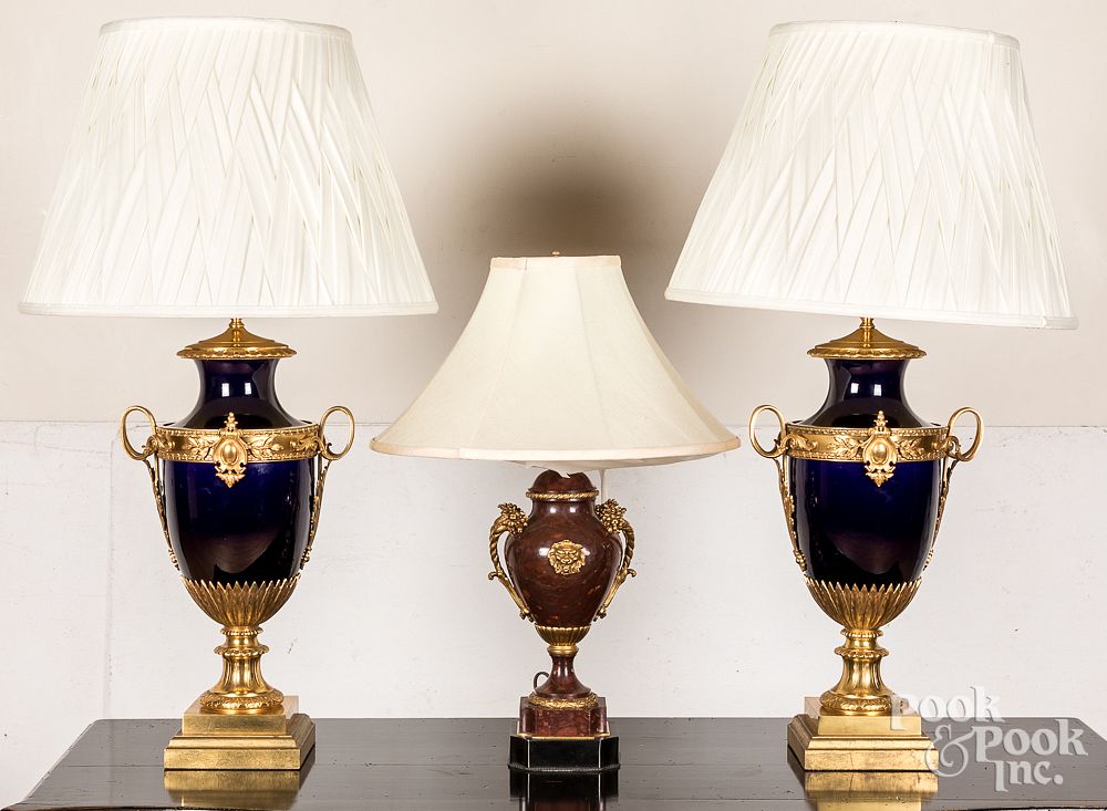 Appraisal: Three ormolu mounted table lamps Three ormolu mounted table lamps