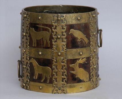 Appraisal: INDIAN INCISED BRASS-MOUNTED HARDWOOD BUCKET With horizontal bands and vertical