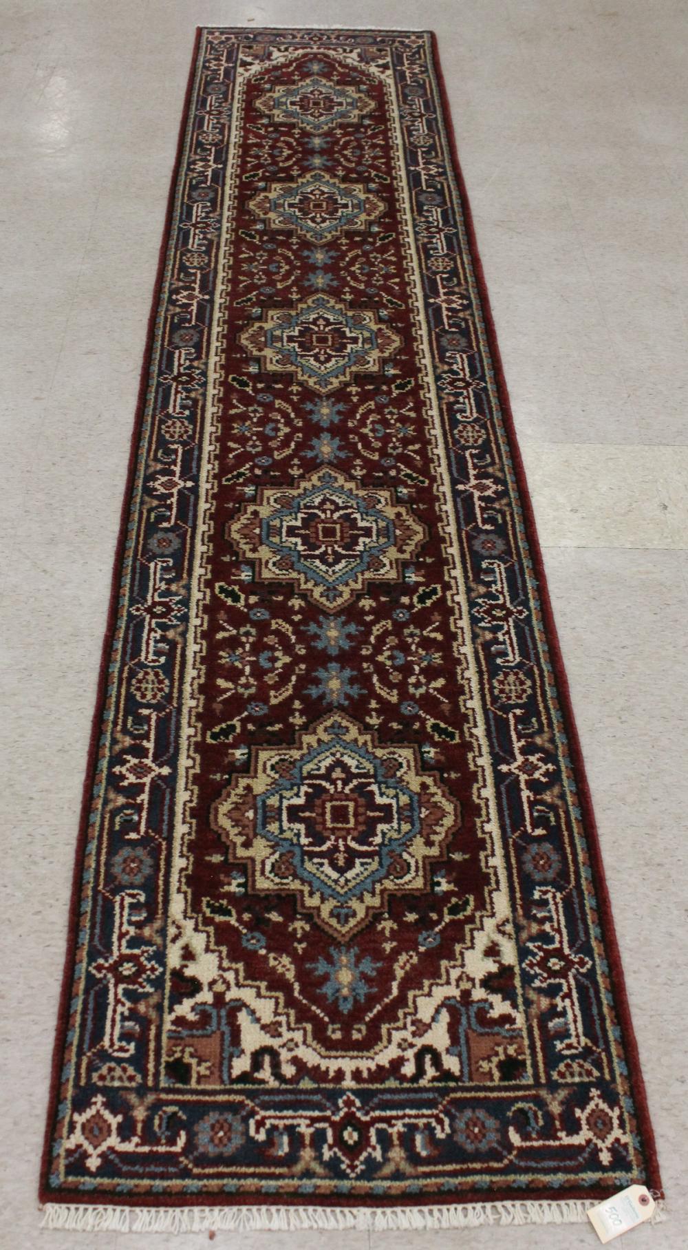 Appraisal: HAND KNOTTED ORIENTAL RUNNER Persian Serab design on red ground