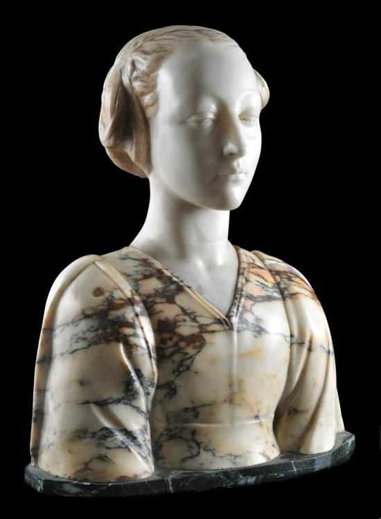 Appraisal: A carved and coloured marble bust Circa Depicting a Medieval