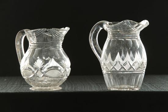 Appraisal: TWO CLEAR CUT PITCHERS American th century Pittsburgh strawberry diamonds