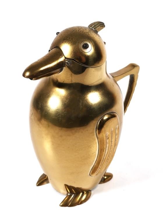 Appraisal: Art Deco cast and molded brass penguin form cocktail shaker