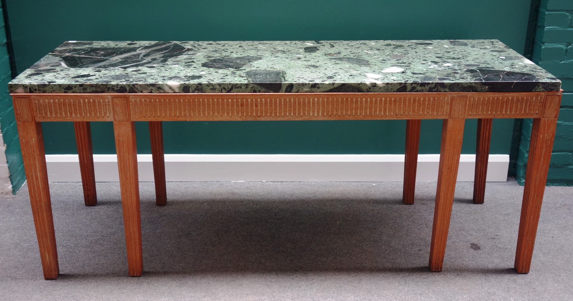 Appraisal: A th century serving table the rectangular marble top with