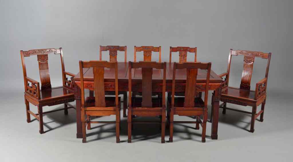 Appraisal: A Fine Chinese Rosewood Table ChairsA fine Chinese rosewood dining