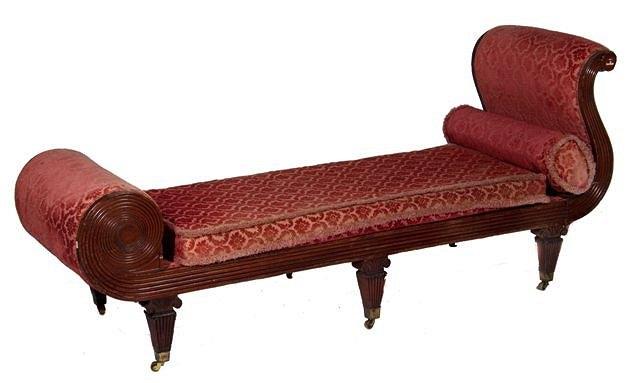 Appraisal: A REGENCY MAHOGANY SCROLL END SETTEE spiral fluting and scroll