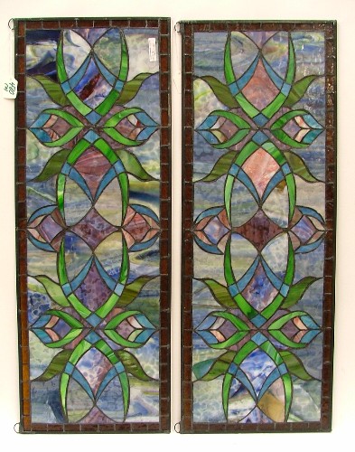 Appraisal: PAIR STAINED AND LEADED GLASS WINDOW PANELS in steel sash