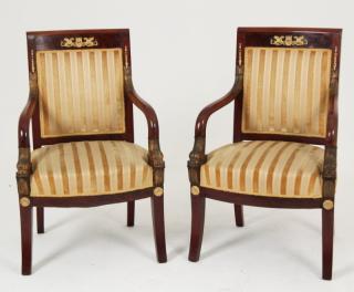 Appraisal: PAIR OF EMPIRE REGENCY BRONZE MOUNTED DOLPHIN CARVED ARM CHAIRS