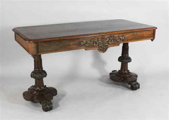 Appraisal: A William IV rosewood library table with two drawers on