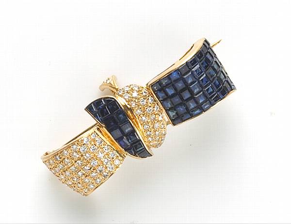 Appraisal: A sapphire diamond and k gold brooch-pendant estimated total diamond