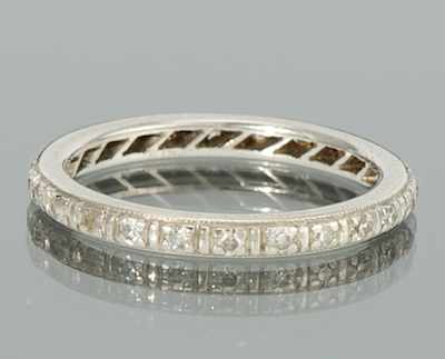 Appraisal: A Ladies' Platinum and Diamond Eternity Band Platinum eternity band