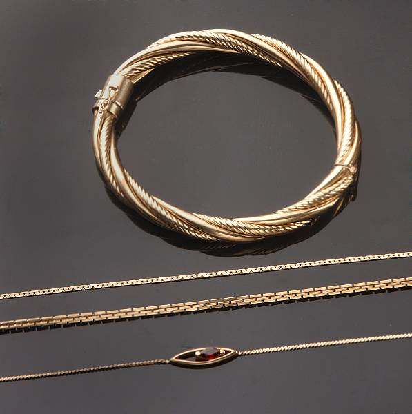 Appraisal: A collection of gold jewelry comprising of one bangle three