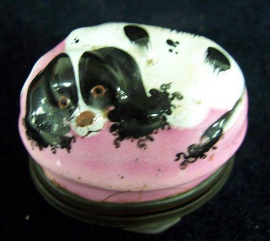 Appraisal: An enamel snuff box modelled and painted as a spaniel