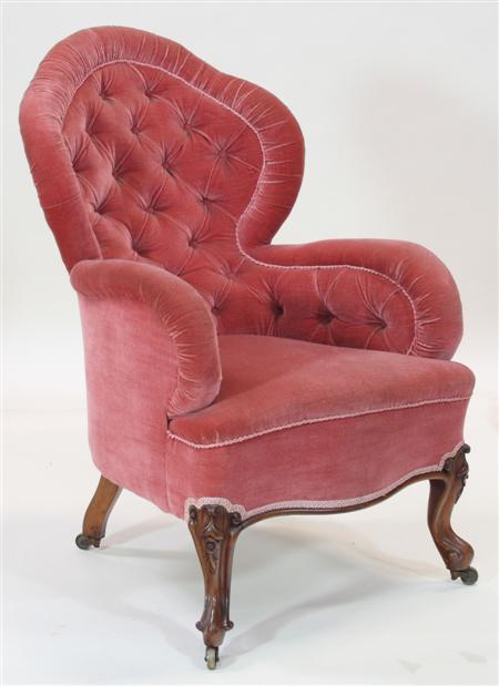 Appraisal: A Victorian mahogany framed button back armchair upholstered in pink