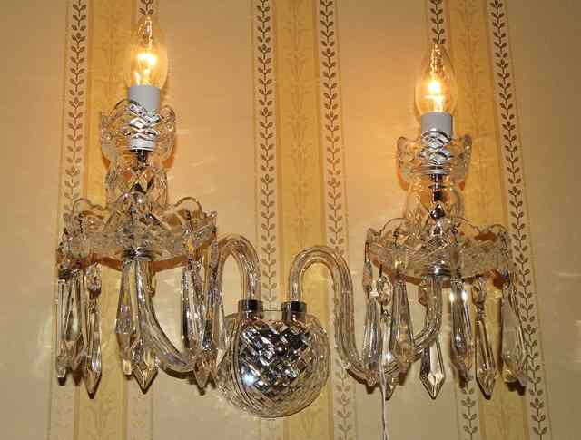 Appraisal: A SET OF FOUR CUT GLASS TWO BRANCH WALL LIGHTS