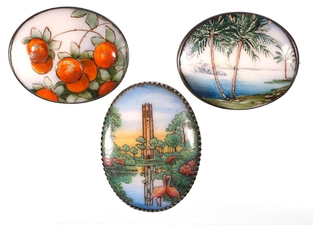 Appraisal: Three vintage handpainted porcelain souvenir pins with Florida scenes each