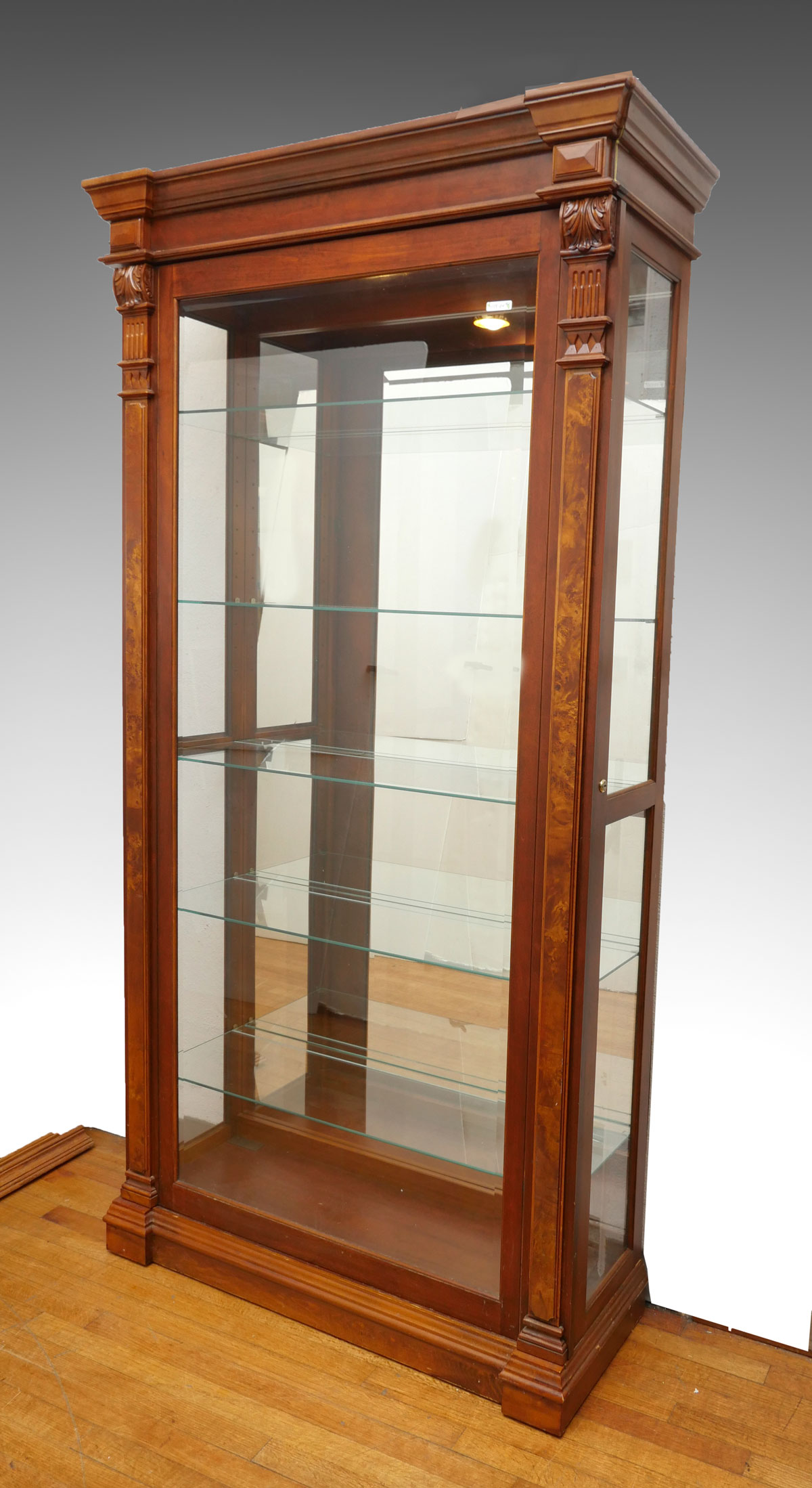 Appraisal: SLIDING DOOR CURIO CABINET Single light sliding door curio cabinet