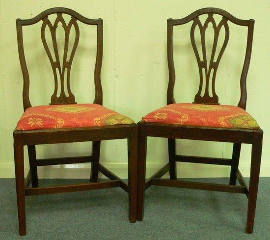 Appraisal: A pair of late th Century dining chairs with pierced