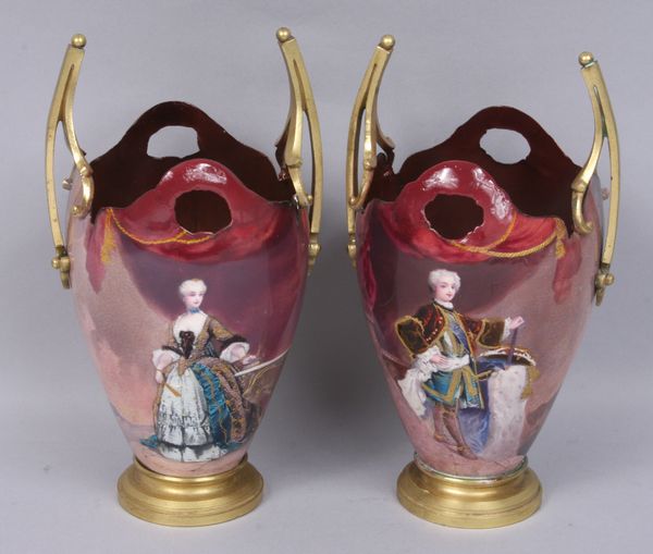 Appraisal: Painted porcelain vases with brass top hook EST