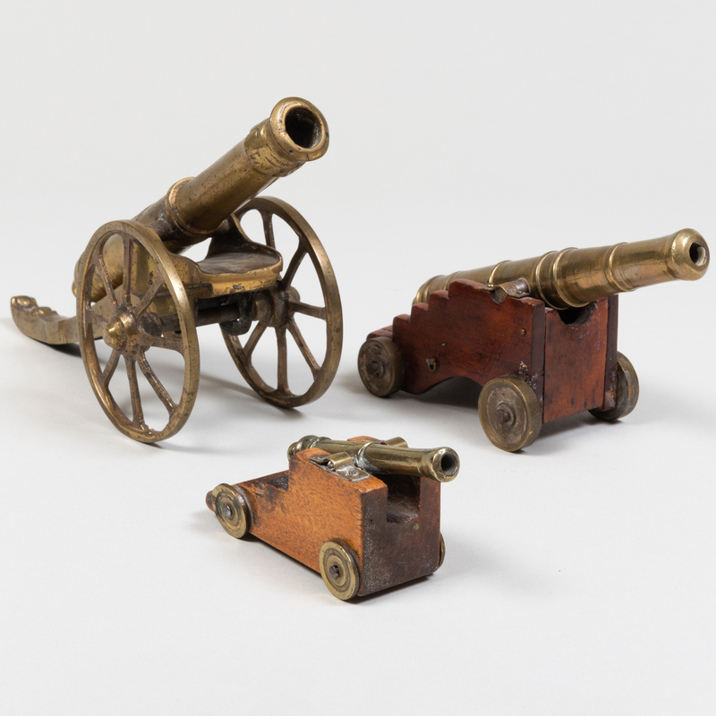 Appraisal: Three Brass Models of Cannons Comprising A brass model cast