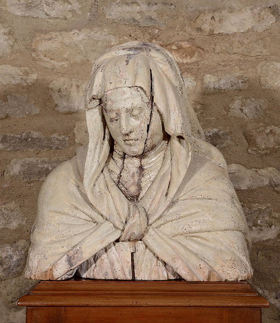 Appraisal: A CARVED WOODEN BUST of the Virgin Mary with bowed