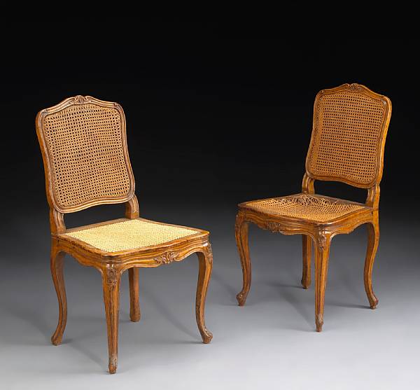 Appraisal: A set of twelve Louis XV style walnut dining chairs