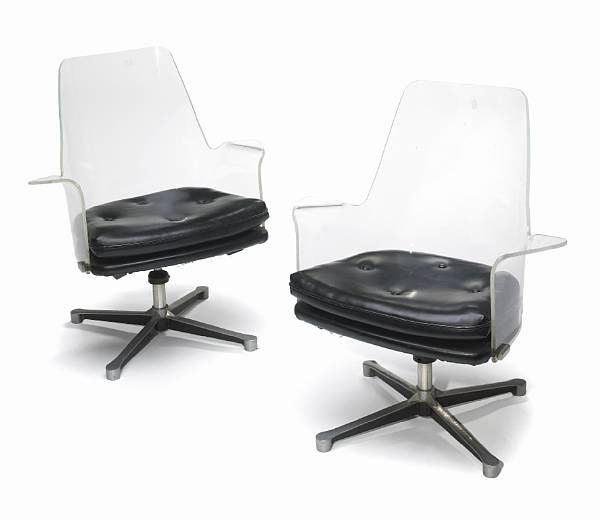 Appraisal: A pair of lucite and chrome armchairs mid th century