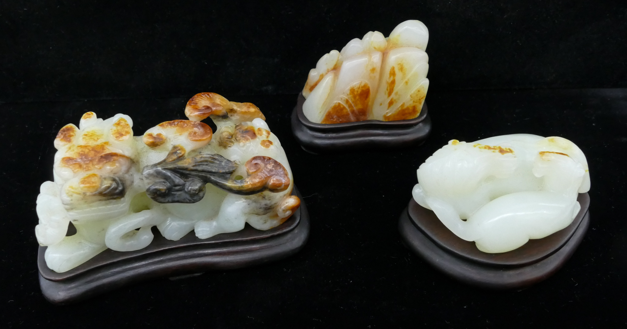 Appraisal: pc Chinese Russet Splash Jade Carvings on Stands '' to