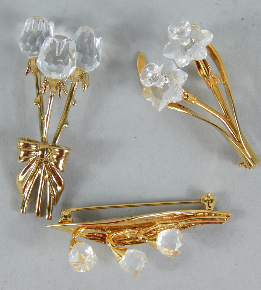 Appraisal: Three Swarovski crystal brooches each of flowers boxed