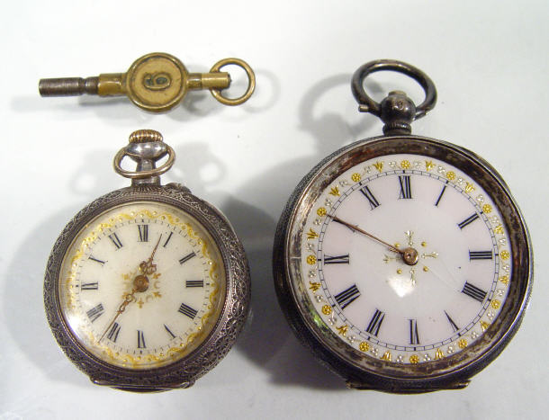 Appraisal: Two ladies silver floral chased enamel faced pocket watches