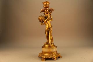 Appraisal: French Gilt Cherubic Candlestick w Onyx Antique Gilt Cherubic Candle